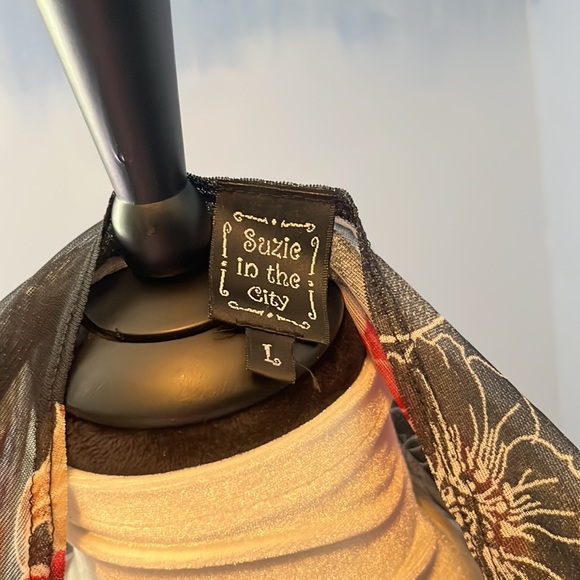 Black sheer blouse with red and black flowers and tan accents. Size Large, $14 - Picture 6 of 6